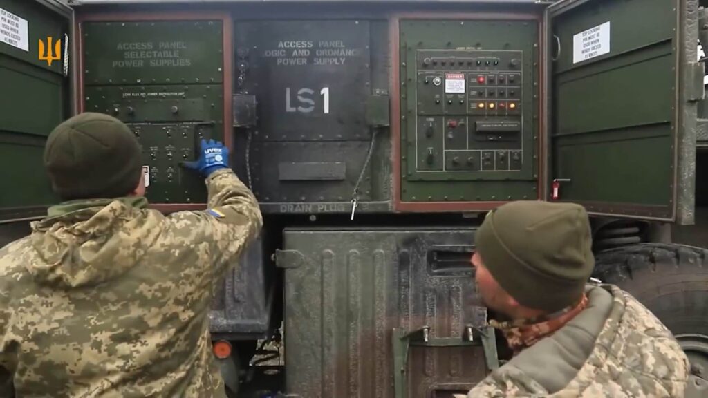 Ukrainian soldiers are working on one of the German-delivered Patriot fire units in Ukraine