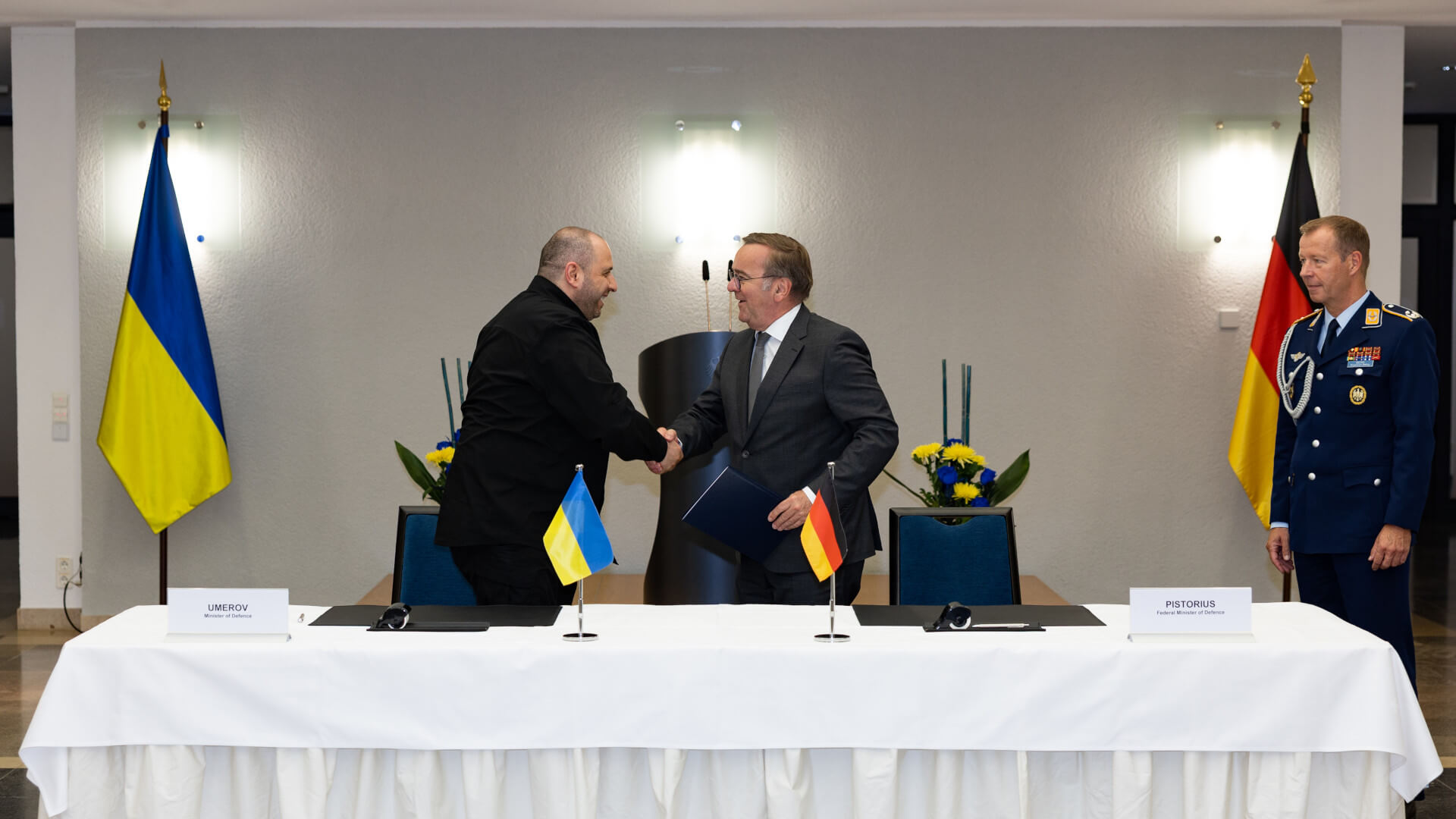 Umerov and Pistorius shake hands