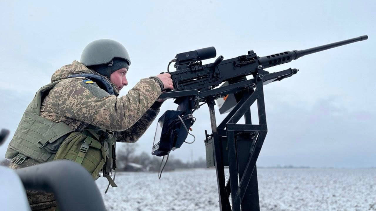 Ukrainian soldier operates a pickup truck-based AA system